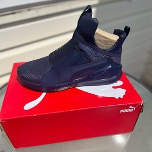 Navy blue puma sneakers